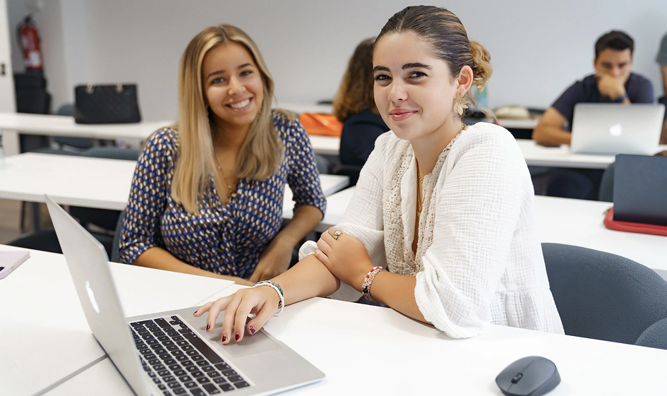Students working on laptops at GBSB Global campus